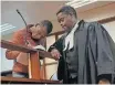  ?? ANELISA KUBHEKA ?? NKOSINATHI Steve Zungu with his attorney Jabulisa Malinga on Friday in the Durban High Court. |