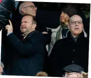  ??  ?? SALUTE: Solskjaer signals his delight to the fans (left) and Woodward and Glazer watch on at Craven Cottage (above)