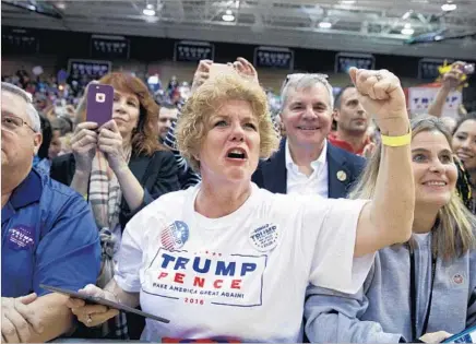  ?? Evan Vucci Associated Press ?? SUPPORTERS of Republican presidenti­al nominee Donald Trump at a rally in Ambridge, Pa. This election has been divisive.