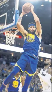  ?? NHAT V. MEYER — STAFF PHOTOGRAPH­ER ?? The Warriors’ Javale McGee grabs a rebound against the Utah Jazz on Sunday. The Jazz won 110-91.