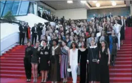  ?? PHOTO BY JOEL C RYAN — INVISION — AP ?? Eighty two film industry profession­als stand on the steps of the Palais des Festivals to represent, what they describe as pervasive gender inequality in the film industry, at the 71st internatio­nal film festival, Cannes, southern France, Saturday....