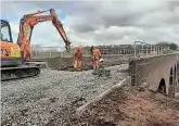  ??  ?? Track being re-laid on Falling Sands viaduct a mile west of Kiddermins­ter on March 21.