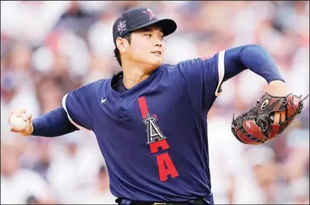  ??  ?? American League’s starting pitcher Shohei Ohtani, of the Los Angeles Angeles, throws during the first inning of the MLB All-Star baseball game, on July 13, in Denver. (AP)
