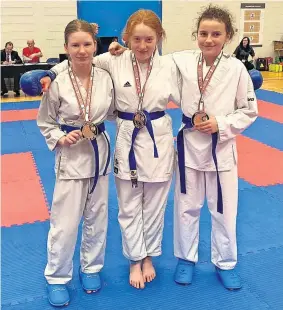 ?? ?? Brilliant effort The girls’ 12-13 years team took bronze at Ravenscrai­g