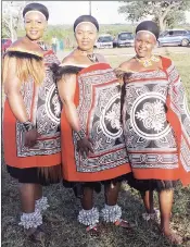  ?? ?? Malindza Umphakatsi Chief Ndlondlo Tsabedze’s wife, Inkhosikat­i LaNkhosi flanked by Nelisiwe Dlamini (L) and Goodness Vilakati after they delivered gifts to Their Majesties.