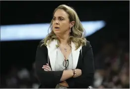  ?? JOHN LOCHE — THE ASSOCIATED PRESS FILE ?? The WNBA suspended Las Vegas Aces coach Becky Hammon for two games without pay on Tuesday for violating league and team respect in the workplace policies. The violation was related to comments made by Hammon to Dearica Hamby in connection with the player's recent pregnancy.