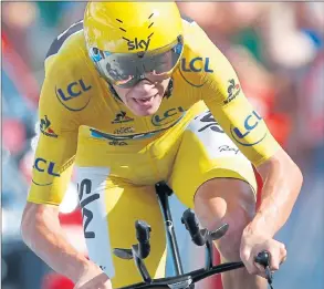  ??  ?? DOMINANCE: Chris Froome croses the finish line to with the 18th stage of the Tour de France