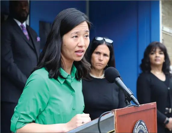  ?? NANCY LANE / HERALD STAFF ?? COLOR-CODED: Mayor Michelle Wu announces a major investment in Boston public school facilities during a press conference outside the McKinley Elementary School.