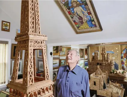  ?? TIM TAI Philadelph­ia Inquirer/TNS ?? Walter Deuschle needed something to pass the time during the pandemic and to help him power through chemothera­py. So he built the Eiffel Tower with about 2,000 corks over nine months.