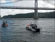  ?? TODD BENDER, VIA MID—HUDSON NEWS NETWORK ?? Police boats search the Hudson River near the Mid-Hudson Bridge on Tuesday, July 24, 2018.