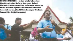  ??  ?? FOR THE FARMERS — In this photo taken last May 20, Agrarian Reform Secretary Rafael Mariano is shown speaking to farmers belonging to the Madaum Agrarian Reform Beneficiar­ies Associatio­n, Inc. (MARBAI) in Barangay Madaum, Tagum City. (Keith Bacongco)