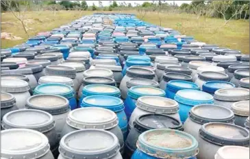  ?? SUPPLIED ?? Barrels of sausage casings were seized by officials in Kampong Speu province.