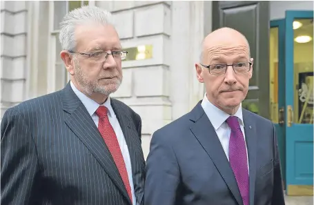  ?? Picture: PA. ?? Scotland’s Brexit minister Mike Russell, left, and Deputy First Minister John Swinney in London.