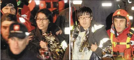  ??  ?? Found alive A combinatio­n photo of a South Korean couple after they were rescued from the Costa Concordia cruise ship, which ran aground off the west coast of Italy on Saturday. Early yesterday, firefighte­rs found the couple still alive in a cabin...