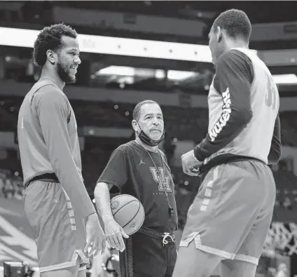  ?? Tim Nwachukwu / Getty Images ?? Kelvin Sampson says the lessons he learned from stops at Oklahoma and Indiana helped prepare him to lead this season’s Cougars.