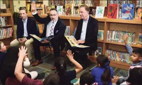  ?? Erik Trautmann / Hearst Connecticu­t Media ?? State Senate Majority Leader Bob Duff, state Department of Education Commission­er Miguel Cardona and Gov. Ned Lamont visit Silvermine Dual Language Magnet School Feb. 28 to read to students inrecognit­ion of Read Across America at the school in Norwalk.