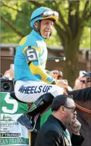  ?? PHOTO COURTESY NYRA/SUSIE RAISHER ?? National Museum of Racing and Hall of Fame jockey Victor Espinoza is seen here sitting atop American Pharoah prior to the running of the 2015 Belmont Stakes.