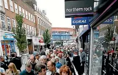  ??  ?? Anxious customers queued outside Northern Rock bank in England when it collapsed in 2007.