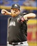  ?? JIM DAMASKE / TAMPA BAY TIMES ?? Marlins starting pitcher Dan Straily has added a sinker to his repertoire and it helped him get the win over the Rays on Friday in St. Petersburg. He threw 96 pitches, including 13 sinkers.