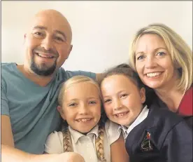  ??  ?? Postman Alexey Shepelev with daughters Maya and Lola and wife Tanya , left, and the sisters enjoying a virtual lesson while at home