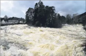  ??  ?? Courier reader David McGregor sent us this picture showing the torrent of water flowing through the Falls of Dochart at Killin yesterday.