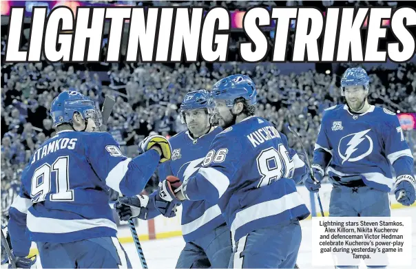  ??  ?? Lightning stars Steven Stamkos, Alex Killorn, Nikita Kucherov and defenceman Victor Hedman celebrate Kucherov’s power-play goal during yesterday’s game in Tampa.