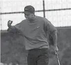  ?? NETWORK PORTER BINKS/USA TODAY ?? Tiger Woods gives his signature fist pump on the 18th green after winning the 1997 Masters by 12 strokes at Augusta National.