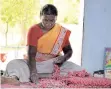  ?? ?? A woman engaged in making crackers at a factory in Sivakasi, Virudhunag­ar district