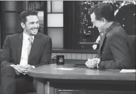  ?? The Associated Press ?? In this image released by CBS, actor and Golden Globe winner James Franco appears with host Stephen Colbert on The Late Show with Stephen Colbert, Tuesday.