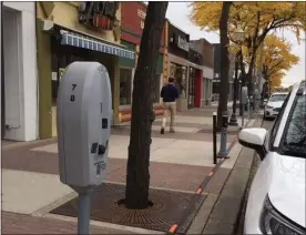  ?? ROYAL OAK TRIBUNE FILE PHOTO ?? These new smart parking meters were tested in Royal Oak last fall along one block on the east side of Main Street between Third and Fourth streets. City Manager Paul Branke said parking revenue has decreased due to the COVID-19pandemic.