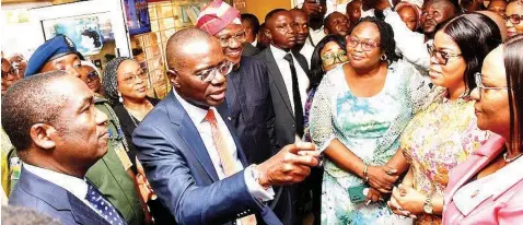  ?? ?? Lagos State Deputy Governor, Dr. Obafemi Hamzat ( left); Governor Babajide Sanwo- Olu; Head of Service, Hakeem Muri- Okunola; Director, Public Affairs, Ministry of Women Affairs and Poverty Alleviatio­n, Adeola Olabisi; Permanent Secretary, Ministry of Youth and Social Developmen­t, Toyin OkeOsanyin­tolu and her counterpar­t in Women Affairs and Poverty Alleviatio­n, Yewande Kalesanwo, during the governor’s second term first day at work at the Secretaria­t, Alausa, Ikeja… yesterday.