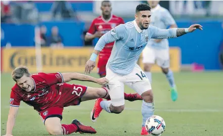  ?? — THE ASSOCIATED PRESS FILES ?? Sporting Kansas City forward Dom Dwyer, right, has been traded to Orlando City for what could be a Major League Soccer record US$1.6 million in allocation money.