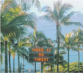  ?? AP PHOTO ?? LATER: An electronic sign says the emergency alert was in error, but it took 38 minutes for Hawaii to correct the mistake.