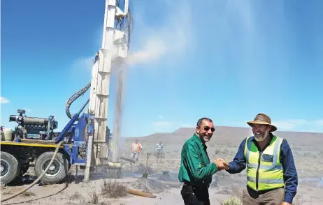  ?? Picture: Gift of the Givers ?? GIFT OF LIFE: Imtiaz Sooliman and hydrologis­t Dr Gideon Groenewald after they found water in Beaufort West.