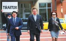  ?? Reuters ?? ■ Paul Manafort (centre)arrives with his wife Kathleen for an arraignmen­t at the federal courthouse in Alexandria, Virginia, on March 8.