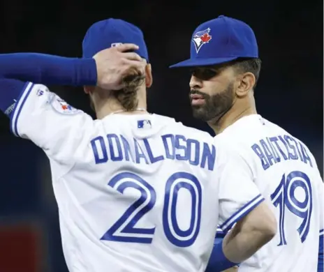  ?? CARLOS OSORIO/TORONTO STAR ?? Josh Donaldson and Jose Bautista were partners on the left side of the infield Sunday, an arrangemen­t Richard Griffin would like to see more often.