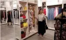  ??  ?? A woman looks at clothes at Rent the Runway, an online subscripti­on service for designer dresses and accessorie­s in New York. Photograph: Shannon Stapleton/Reuters