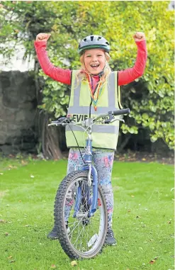  ?? Picture: Dougie Nicolson. ?? Champion: Seven-year-old Evie Hughes, of Pittenweem, raised £2,400 for local charities.