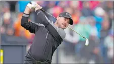  ?? KIN CHEUNG/AP PHOTO ?? Brian Harman plays off the 4th tee during the second day of the British Open Golf Championsh­ips on Friday at the Royal Liverpool Golf Club in Hoylake, England.