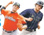  ?? JOSE FERNANDEZ, LEFT, AND WIL MYERS BY USA TODAY SPORTS ??