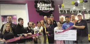  ?? File photo ?? City officials celebrated the opening of a Planet Fitness location at the plaza last year.