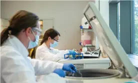  ?? Photograph: John Cairns/University of Oxford/PA ?? Oxford Vaccine Group researcher­s working on the coronaviru­s vaccine developed by AstraZenec­a and Oxford University.