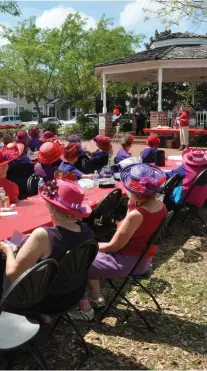  ??  ?? LEFT: Now a national phenomenon, the Red Hat Society is the result of a few women deciding to greet middle age with verve, humour and élan. City of Largo