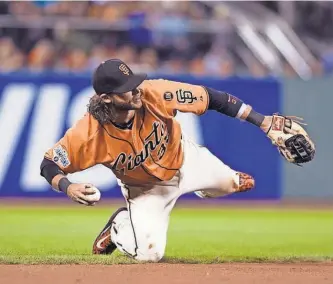  ?? ED SZCZEPANSK­I, USA TODAY SPORTS ?? Shortstop Brandon Crawford set career highs with 21 homers and 84 RBI last season and earned the Gold Glove.