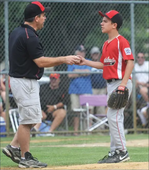 ?? File photo ?? Dave Belisle, left, who coached the Cumberland American Little League all-star team to the Little League World Series in 2011 and 2014, will be back in the ESPN broadcast booth for the New England regional in Bristol, Conn. next month. Belisle is also...