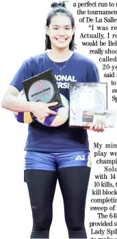  ?? PHOTOGRAPH BY RIO DELUVIO FOR THE DAILY TRIBUNE ?? ALYSSA Solomon of NU emerges as the first Most Valuable Player awardee of the Shakey’s Super League Pre-Season Championsh­ip.