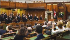  ?? CP PHOTO/SEAN KILPATRICK ?? New Commons Pages take part in a swearing-in ceremony in the House of Commons on Parliament Hill in Ottawa on Sept. 15. The House of Commons resumes today following the summer break.