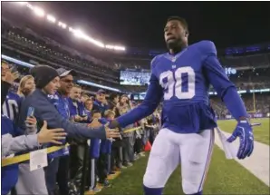  ?? AP FILE ?? Defensive end Jason PierrePaul re-signed with the Giants on a fouryear deal. His right hand was severly damaged after a fireworks accident on July 4, causing him to miss the first half of the 2015 season.