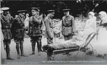  ??  ?? Photograph of King George V visiting a British Red Cross Hospital, 1917