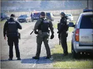  ?? MARSHALL GORBY / STAFF ?? Ohio State Highway Patrol troopers, Greene County and Clark County sheriff’s deputies, and Huber Heights fire and police were searching for a stolen truck and suspect on Haddix Road on Tuesday.